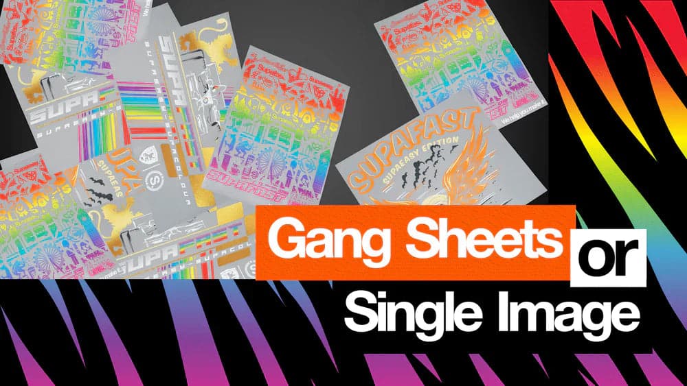 Colorful transfer sheets and single image designs with markers and crafting supplies displayed